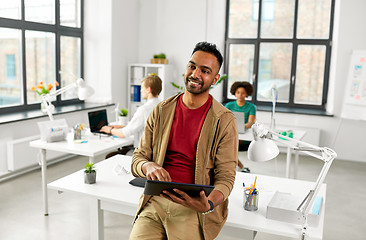 Image showing indian man with tablet pc computer at office