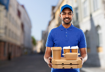 Image showing indian delivery man with food and drinks in city