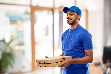 Image showing indian delivery man with takeaway pizza at office