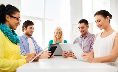 Image showing creative team with table computers in office