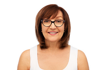 Image showing portrait of senior woman in glasses over white