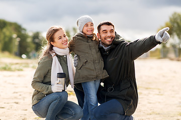 Image showing happy family outdoors in autumn