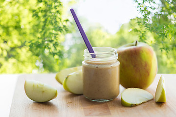 Image showing jar with apple fruit puree or baby food on table