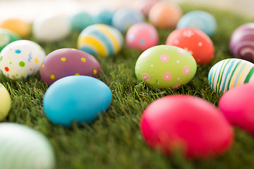 Image showing colored easter eggs on artificial grass