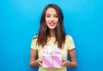 Image showing young woman or teenage girl with birthday gift