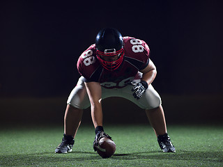 Image showing American football player starting football game