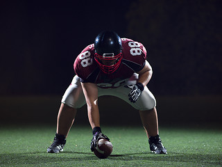 Image showing American football player starting football game