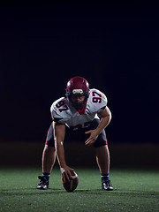 Image showing American football player starting football game