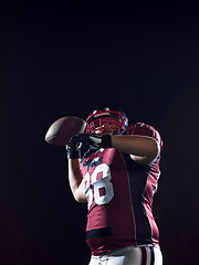 Image showing american football player throwing rugby ball