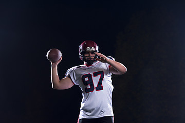 Image showing american football player throwing rugby ball