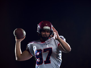 Image showing american football player throwing rugby ball