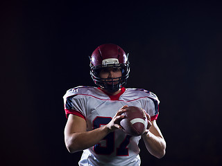 Image showing american football player throwing rugby ball