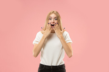 Image showing Beautiful woman looking suprised isolated on pink