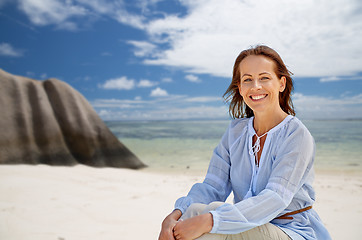 Image showing happy woman over seychelles island tropical beach