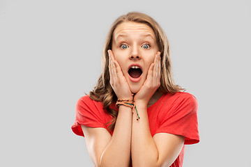 Image showing shocked or scared teenage girl in red t-shirt