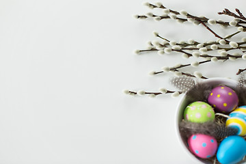 Image showing colored easter eggs and pussy willow branches