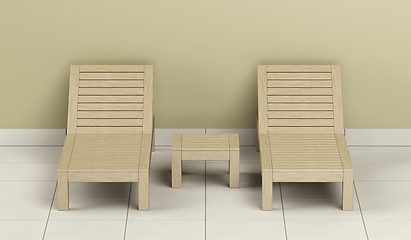 Image showing Wooden sun loungers and table