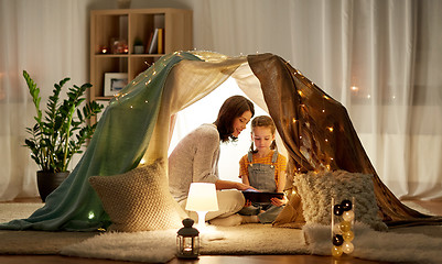 Image showing family with tablet pc in kids tent at home