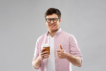 Image showing man in glasses with coffee showing thumbs up