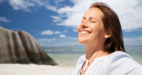 Image showing happy woman over seychelles island tropical beach