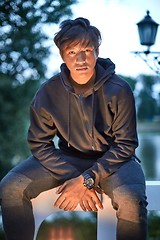 Image showing Outdoor portrait of a young Asian guy