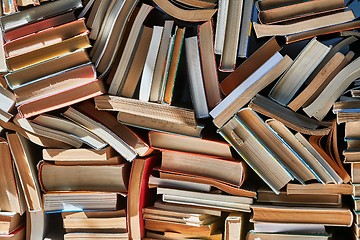 Image showing Wall of books piled up