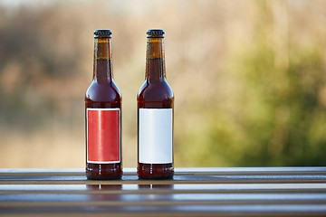 Image showing Beer bottles on a table