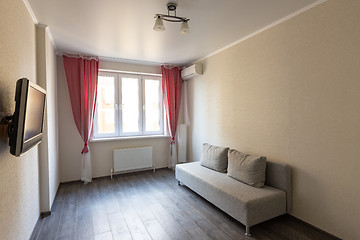 Image showing The interior of a small modest room in a hotel