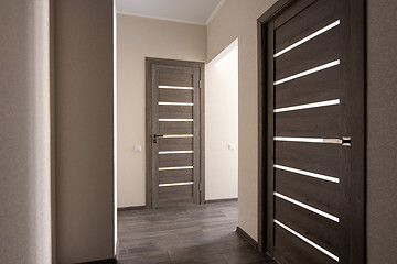 Image showing Corridor in a small apartment, closed doors