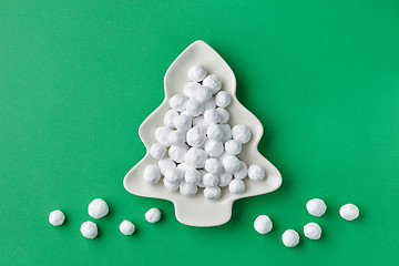 Image showing cranberries covered with powdered sugar on fir shape plate