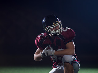 Image showing portrait of young confident American football player