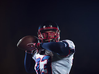 Image showing american football player throwing rugby ball