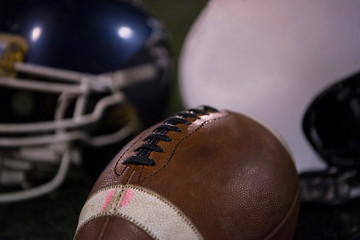 Image showing american football and helmets