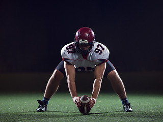 Image showing American football player starting football game