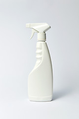 Image showing Mock up plastic spray detergent bottle on light background.