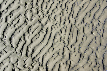 Image showing Traces of Waves on Sand as Background