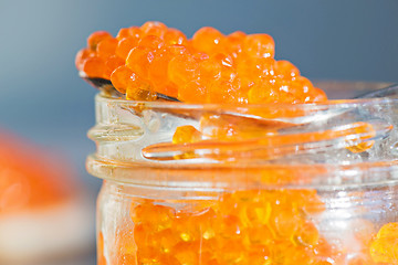 Image showing Macro shot of red caviar on jar