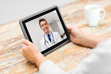 Image showing senior woman patient having video call with doctor