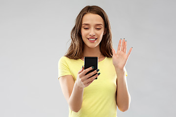 Image showing smiling teenage girl having video call smartphone