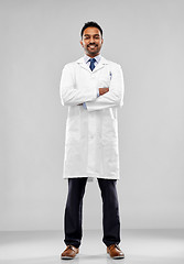 Image showing smiling male doctor or scientist in white coat