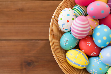 Image showing close up of colored easter eggs in basket