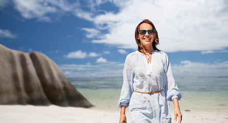 Image showing happy woman over seychelles island tropical beach