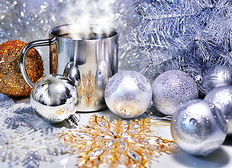 Image showing Christmas decorations with a mug of hot coffee