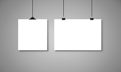 Image showing White paper hanging on binders with black rope with drop shadow. Vector illustration on grey