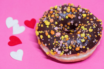 Image showing Macro shoot of donut on pink