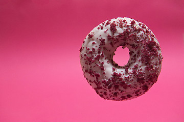 Image showing Macro shoot of donut on pink