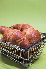 Image showing Macro shoot of croissants in shopping basket