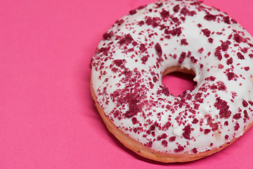 Image showing Macro shoot of donut on pink