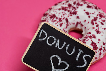 Image showing Macro shoot of donut on pink