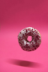 Image showing Macro shoot of donut on pink